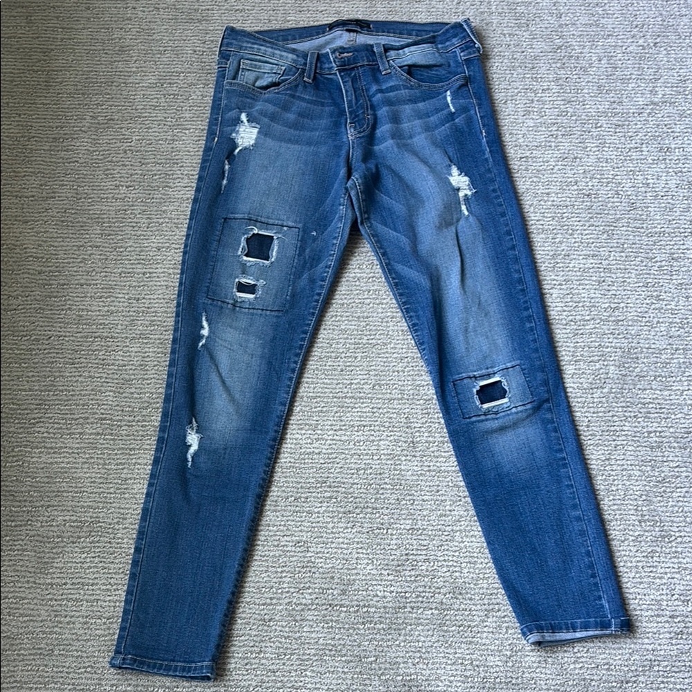 Distressed Blue Jeans